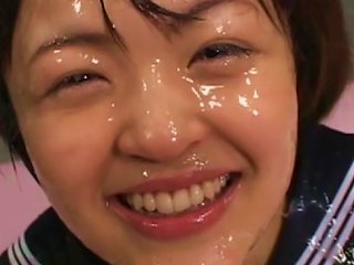 A Charming Asian Woman Receives A Lot Of Semen On Her Face
